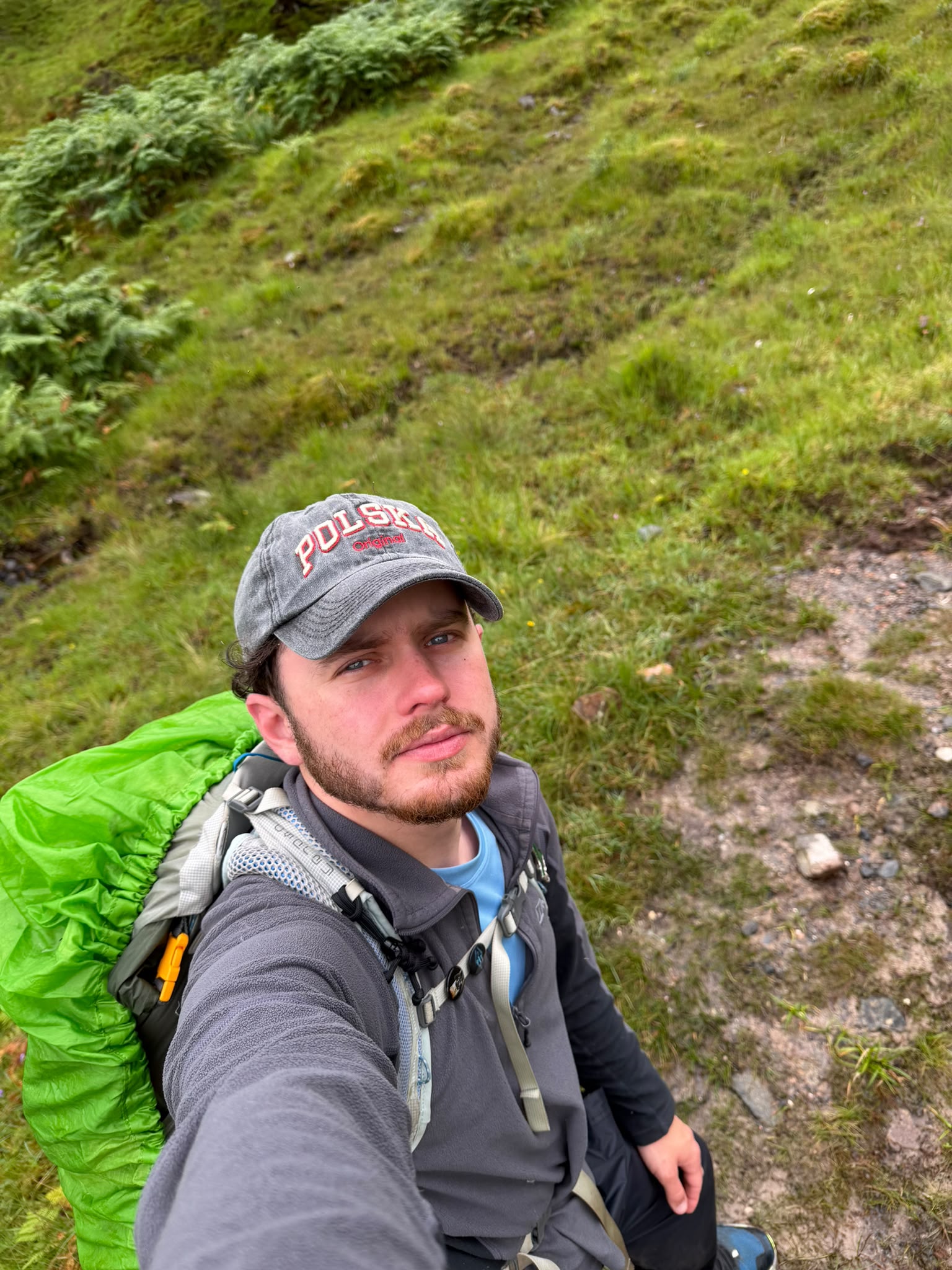 Calum out hiking with a backpack